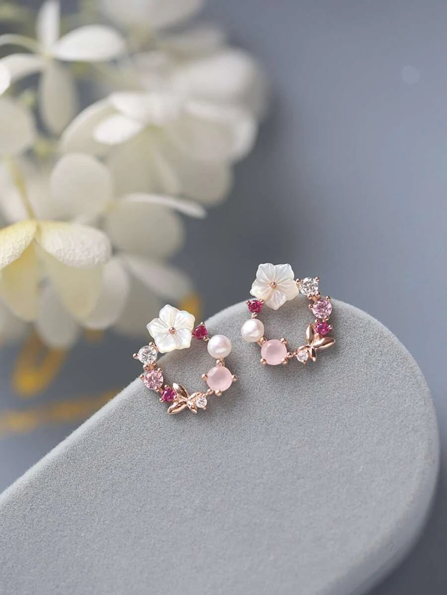 Clous d'oreilles à strass & à fleur