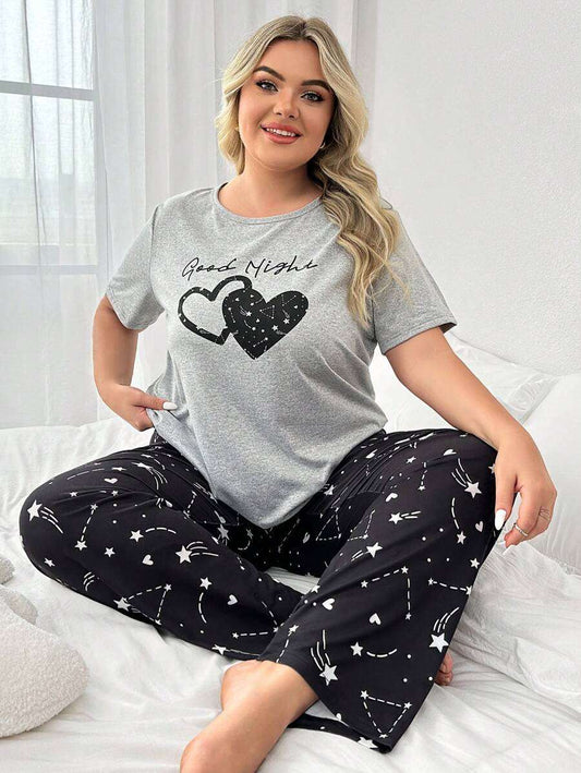 Grande taille pour femmes Ensemble composé d'un haut à manches courtes et col rond imprimé de cœurs et de lettres et d'un pantalon imprimé d'un ciel étoilé comme pyjama, tenue